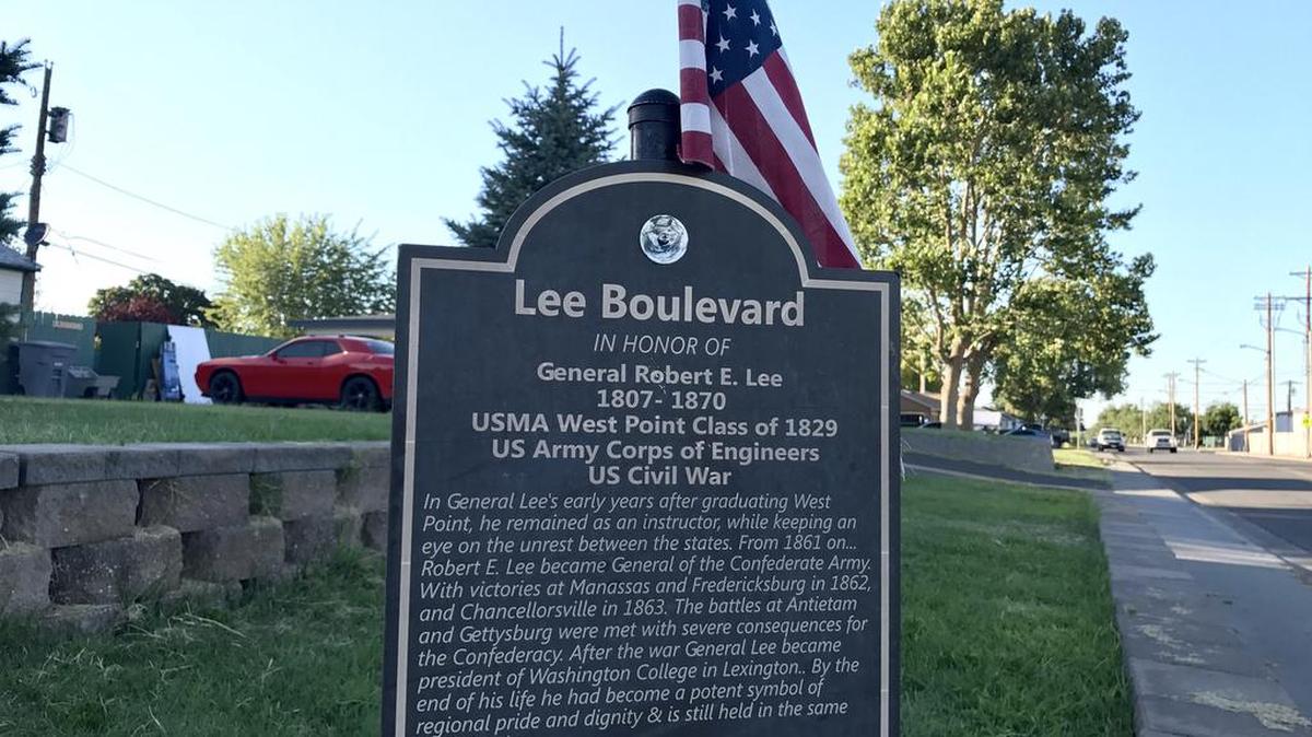 A sign honoring Confederate Gen. Robert E. Lee rests on private property at the corner of Lee Boulevard and Thayer Drive in Richland. An online petition is calling for the street to be renamed for a person of color rather than the controversial general.