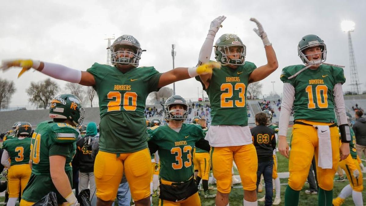 Richland High School’s Ryan Piper, Josh Mendoza and Cade Jensen hop onto a bench and start firing up the crowd during their win against the Central Valley Bears on Saturday at Edgar Brown Memorial in Pasco. The Bombers won 42-10. Read the story on Page 1D.
