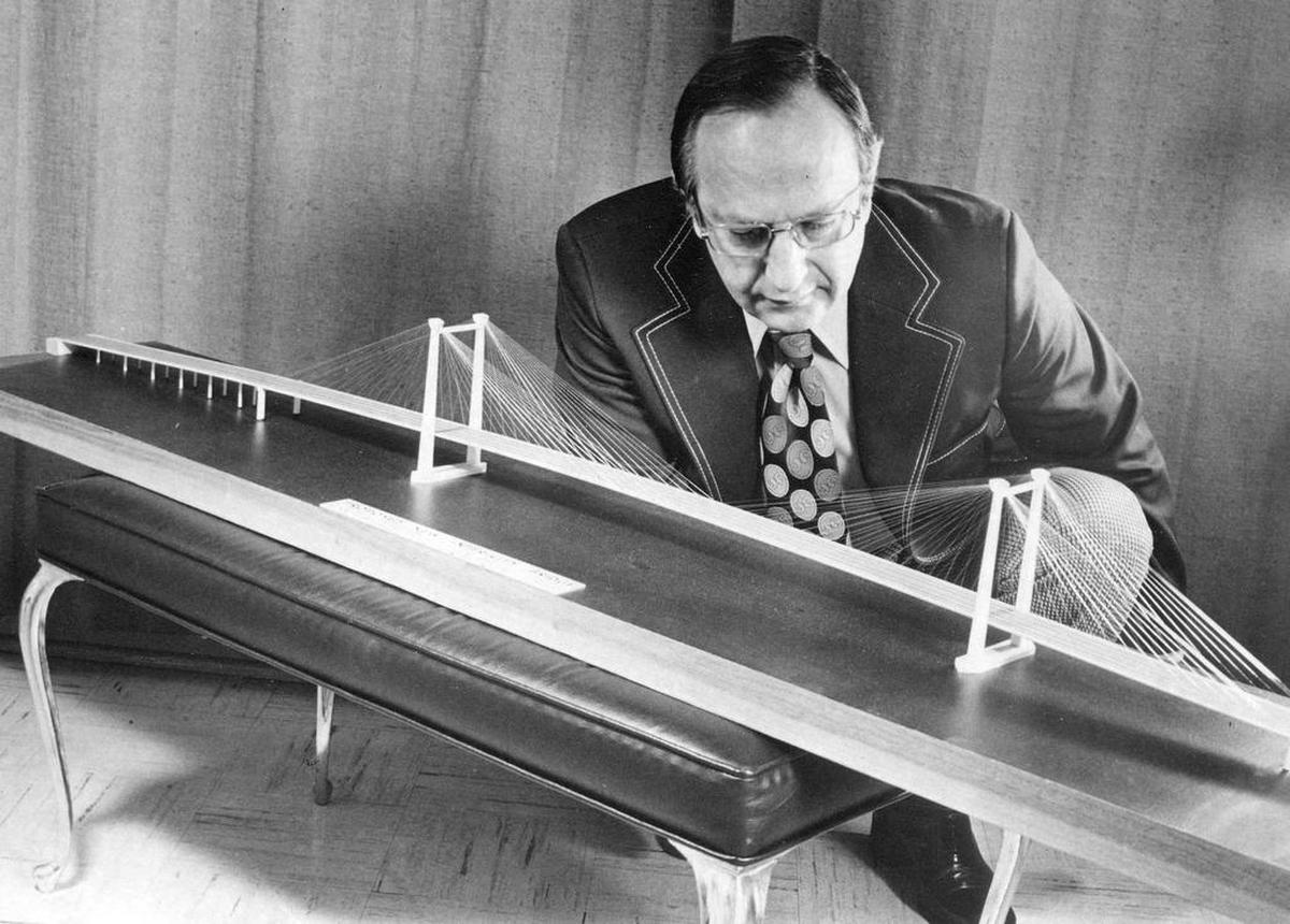 Ed Hendler looks at a model of the then proposed Pasco-Kennewick Intercity cable bridge, in this photo published in 1973. The design featured support by cables of different lengths - a design never built before in the U.S. at the time.