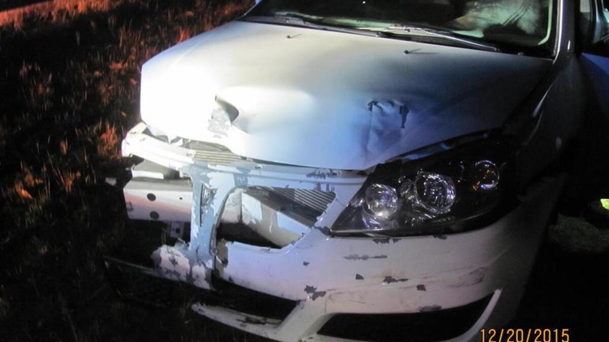 The Pontiac sedan police say Richard Hernandez drove and crashed.