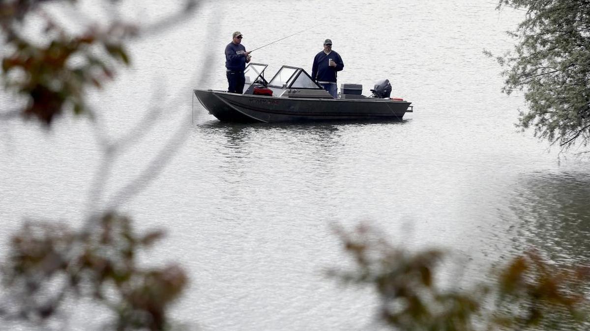 David Boone, left, and Cory Overholt fish for bass in the rain on the Columbia River near Bateman Island in Richland. According to the National Weather Service the rain will clear this weekend with Sunday being sunny with highs in the mid 70’s.