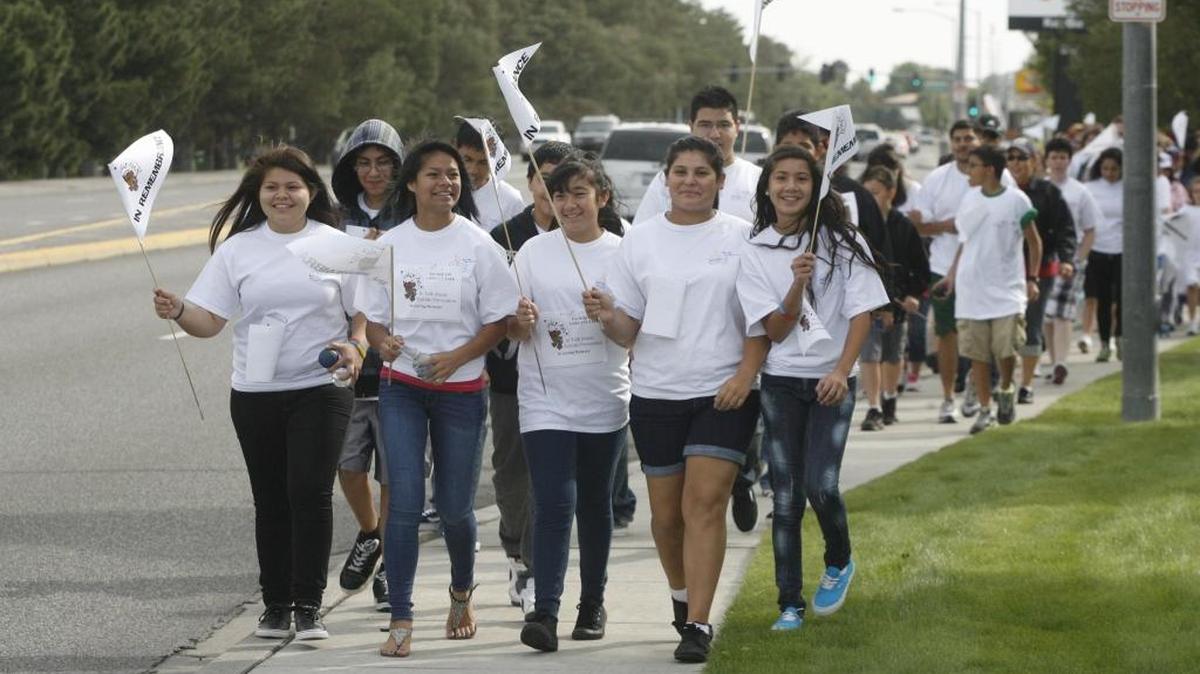 Eighth-graders from Pasco’s Ellen Ochoa Middle School participate in the Walk to Talk About Suicide Prevention event in 2011.