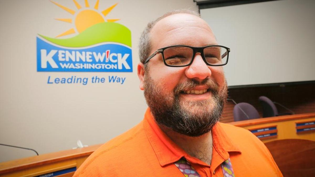 Kennewick voters elected two men — Steve Lee, shown here in the city council chambers, and Bill McKay — with very different ideas about governing but a common interest in making Kennewick a place where entrepreneurs can thrive.