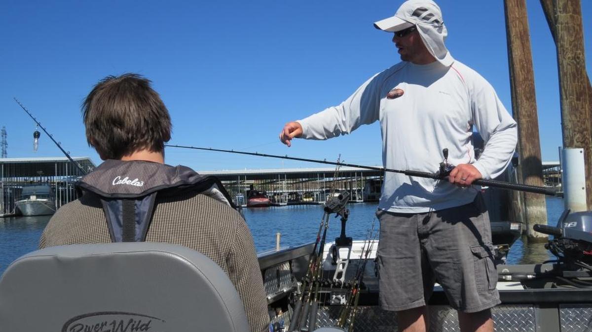 Jacob Munden talks with Zane Guier before they leave on their fishing trip.