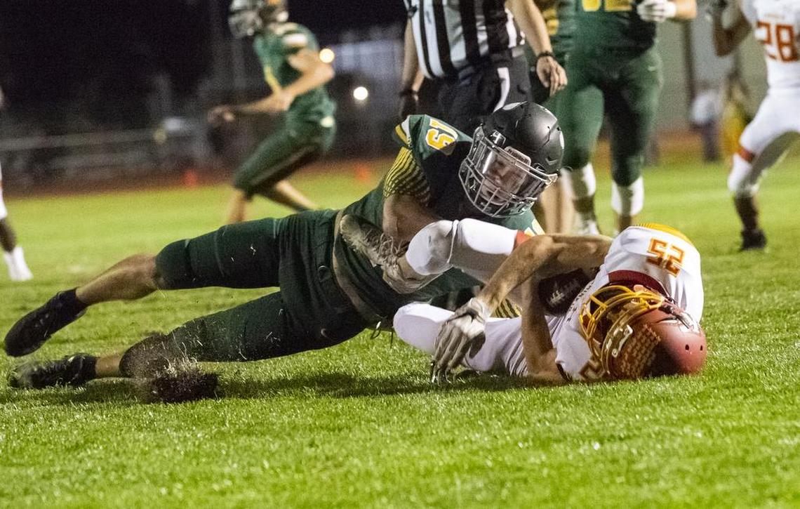 Richland’s Cody Sanderson (19) earned honorable mention in The Associated Press’ All-State Football Team.