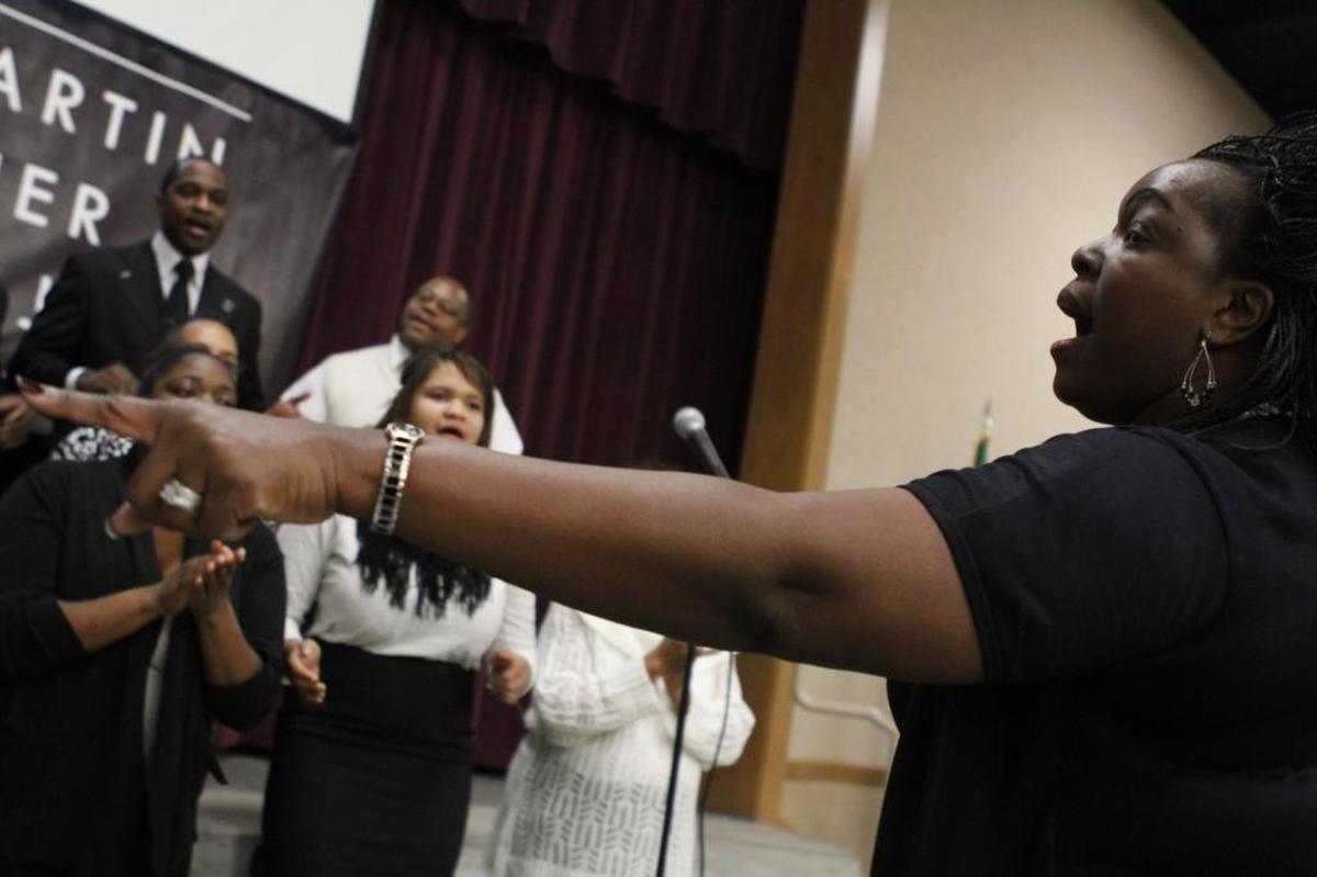 Elouise Sparks leads the Tri-Cities Community Choir at the 2014 Martin Luther King ceremony at Columbia Basin College in Pasco.