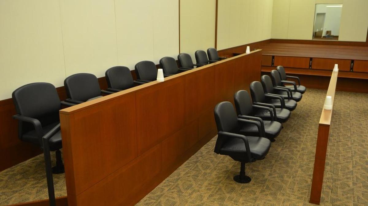 An image of seating for jurors in a courtroom.
