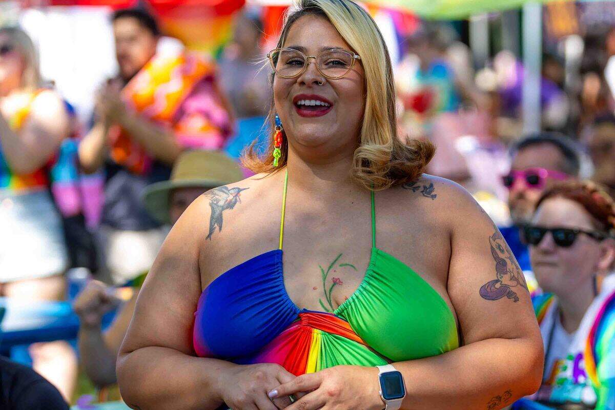 An attendee watches stage performances during the Tri-Cities Pride Festival on June 14 in Pasco.
