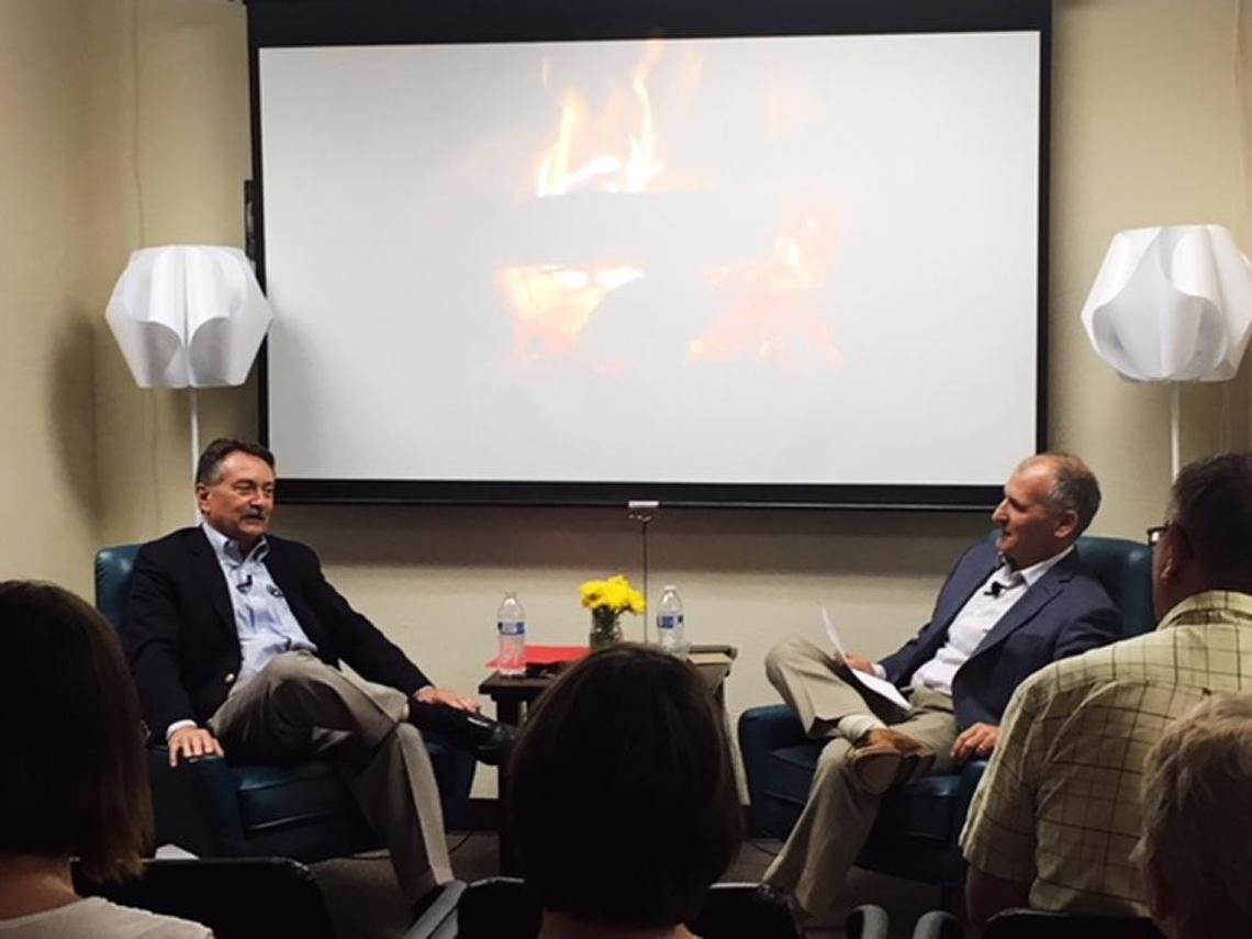 Lane Savitch, left, a longtime Kadlec Regional Medical Center leader who now holds a regional position with Providence St. Joseph Health, is interviewed during a Fuse SPC Fireside Chat last summer.