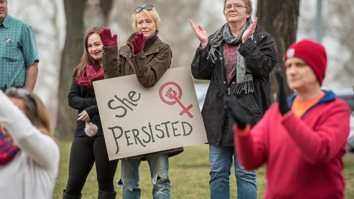 From left, Skylar Coleman, Georgia Cooper and Jane Knox cheer on the speakers at a rally Wednesday afternoon in John Dam Plaza in Richland to celebrate International Women’s Day. About 200 people attended. The event was sponsored by the Honeypot Huddle, a local women’s civic group which formed following the Women’s March on Washington.