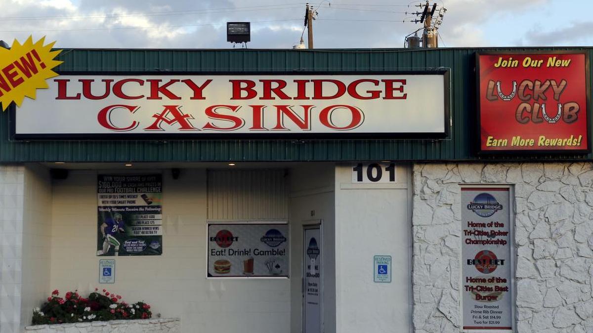 A sign on the door of Lucky Bridge Casino, at 101 S. Gum St. in Kennewick, announced it's closing on Thursday morning.