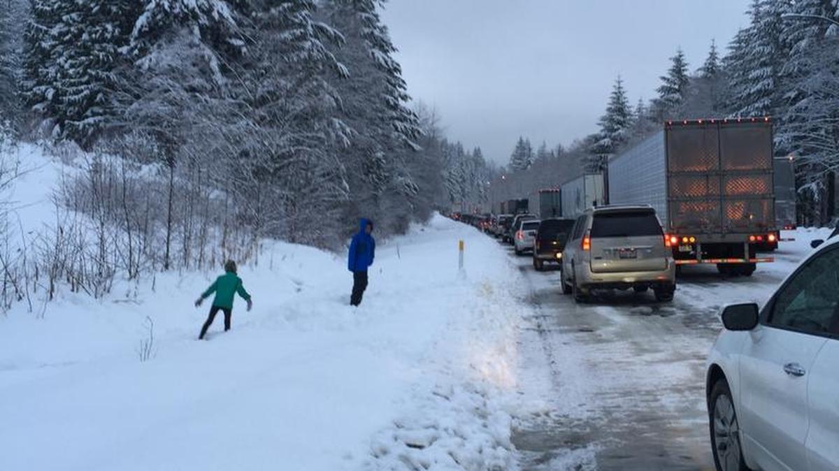 Heavy snow and multiple wrecks east of the Snoqualmie Pass summit have closed eastbound Interstate 90 at North Bend on Friday.