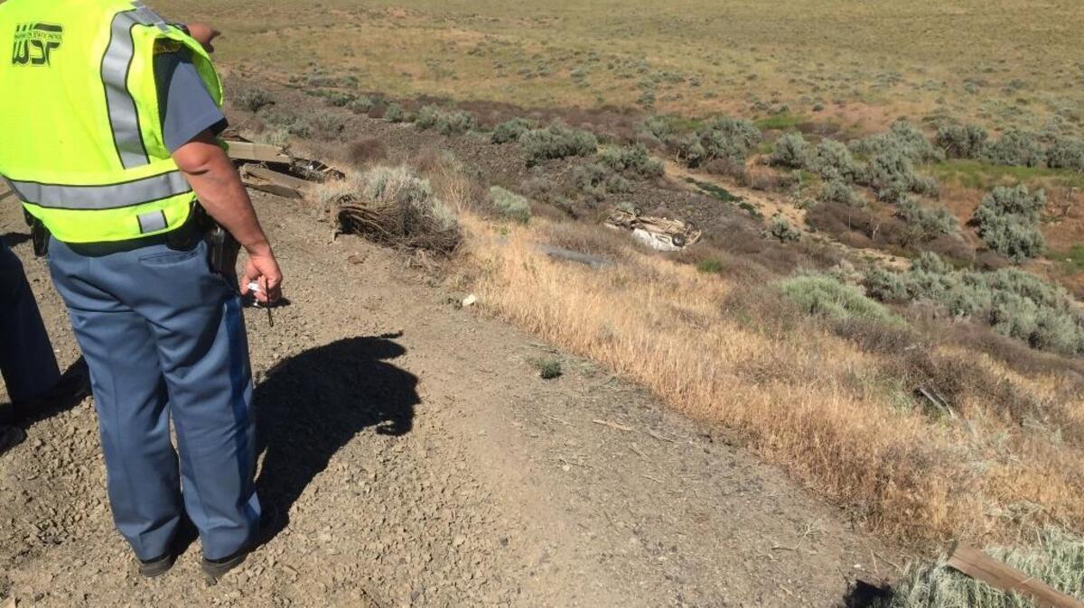A car rolled down a steep embankment injuring seven people on Interstate 82 between Coffin Road and McNary Bridge about 4:30 p.m. Friday.