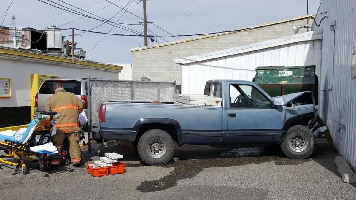 A man drove his pickup into a building on East Columbia Drive Monday when he suffered a medical emergency.