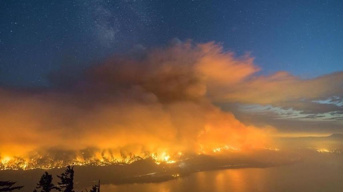 This image released by the Hood River County District Attorney’s Office shows the Eagle Creek fire burning in September along the Columbia River.