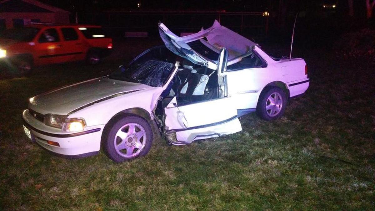 Kennewick police said the driver of this 1992 white Honda Accord was trapped at the legs after failing to stop at a stop sign on W. 7th Avenue late Thursday night.