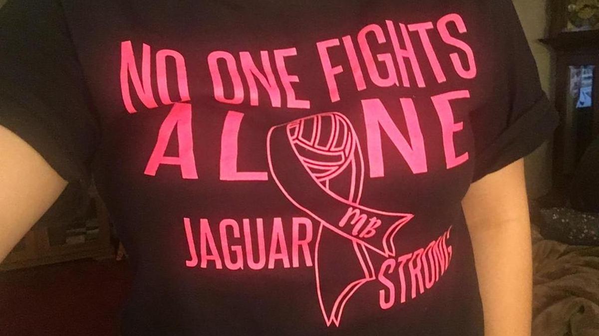 Tri-Cities Prep students sold T-shirts to raise money for their former volleyball coach Marcie Brown of Burbank who was diagnosed last summer with melanoma.