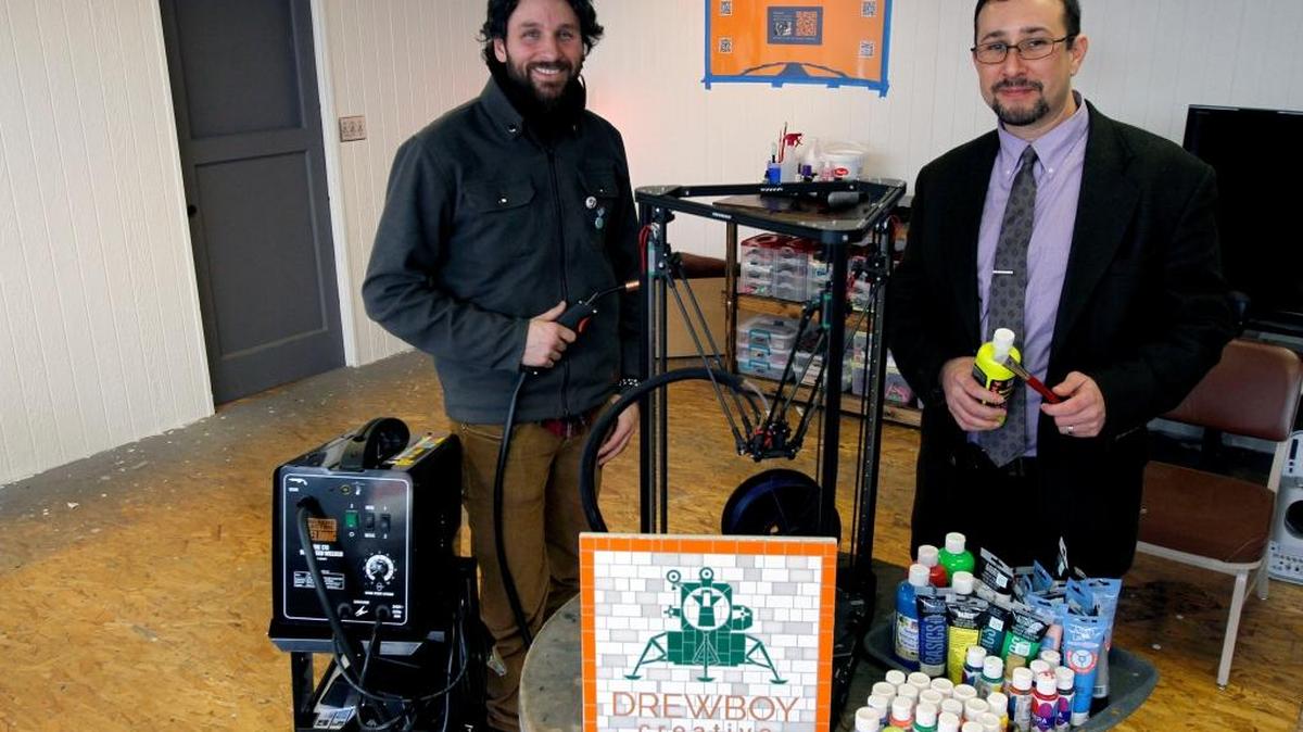 Nick Napoli, left, and Davin Diaz pose with some of the tools available at the new Confluent makerspace in Richland. Napoli is opening the space, which will be a place where people can make art and technology as well as attend classes and events. The DrewBoy Creative art gallery, run by Diaz, will also be featured in the space. The grand opening events start at 10 a.m. Feb. 6 at Confluent, 285 Williams Blvd.