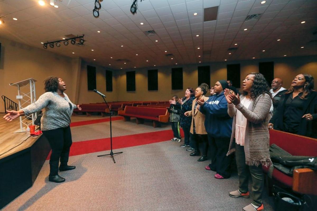 Eloiuse Sparks leads the choir during practice inside of Grace Point Church in Pasco on Saturday.