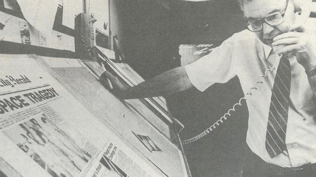 Jack Briggs worked his way up from reporter to publisher at the Tri-City Herald, reporting on much of the history of the area along the way. Here, Briggs works on deadline during the space shuttle explosion in 1986.