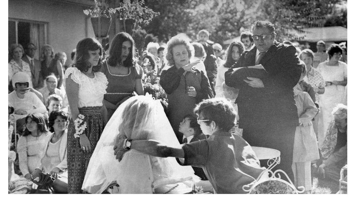 
This photo, published on July 6, 1975, shows the June 27th wedding ceremony of Romele Dripps and Dennis Sneve. Both had cerebral palsy–Dennis was a deaf mute, and Romele could hear but couldn't speak–but their minds and feelings were not impaired. The newlyweds were both residents of Vistavue Care Center in Kennewick.
