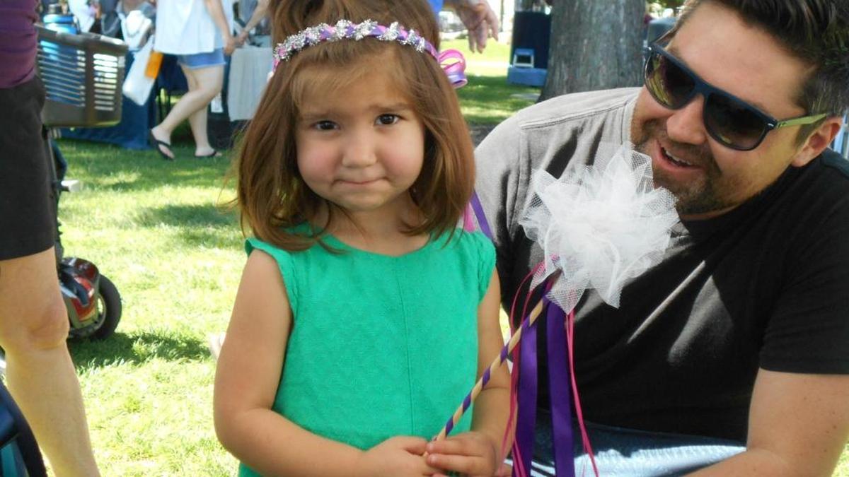 Astrid Azure, 3, of Pasco, poses with her new halo and wand during the 2017 Art in the Park at Richland’s Howard Amon Park. Astrid and her father, Nick, and grandmother, Kim Frodel, were browsing the more than 200 art booths during the program, which continues Saturday.