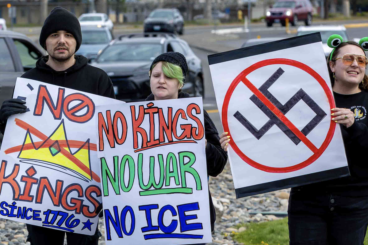 Demonstrators attend Saturday’s “No Kings” protest in Kennewick, protesting the Trump Administration and its military escalation in Iran. It drew about 3,000 protesters.