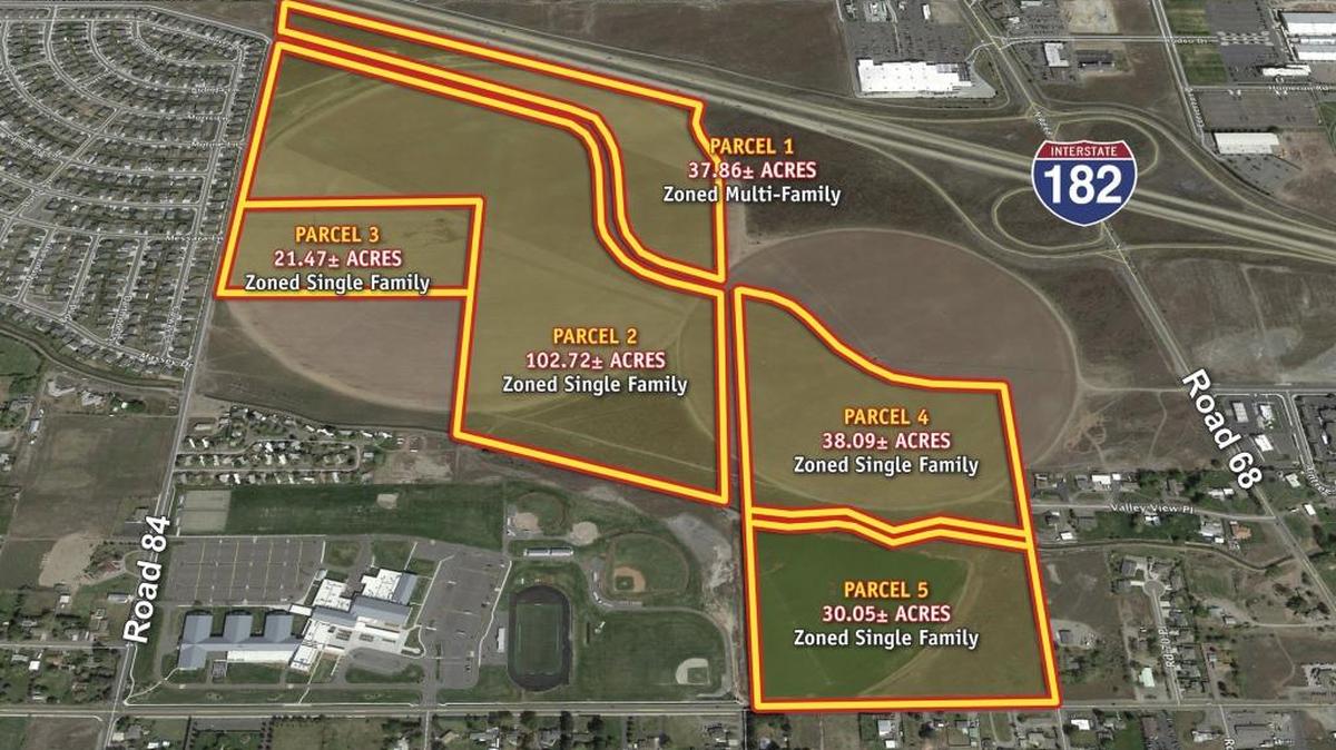 The five parcels of land in the heart of Pasco fetched $10.3 million, nearly twice the amount expected, for the state Department of Natural Resources last November. Pasco auctioneer Scott Musser oversaw the sale.