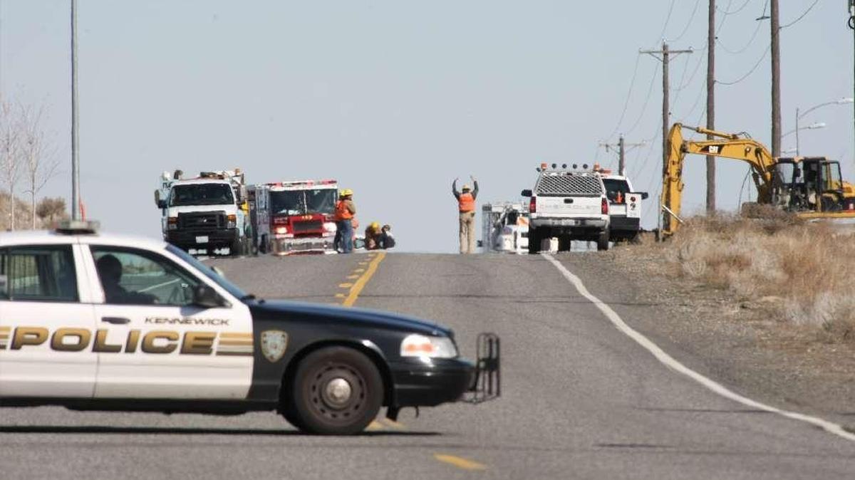 A Kennewick police vehicle blocks traffic after a natural gas leak in Kennewick that did not involve a high-pressure line.