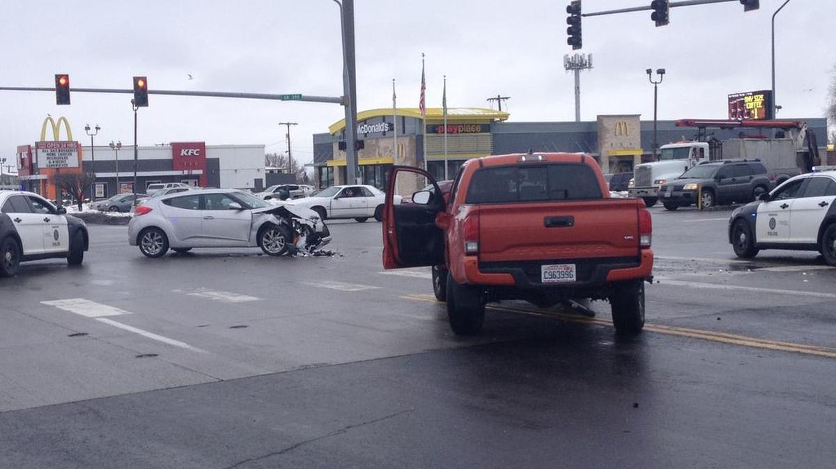 A pickup and a car collided at the intersection of Highway 395 and Kennewick Avenue in Kennewick on Monday.
