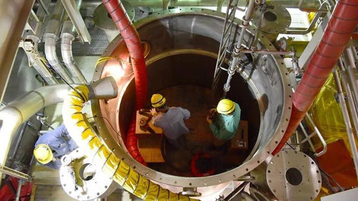Employees work in a process cell in the Low-Activity Waste Facility at the vitrification plant being built at Hanford. A federal audit report says the Department of Energy isn’t doing enough to cut back on the risk of fraud among its contractors, including at the Hanford nuclear reservation.