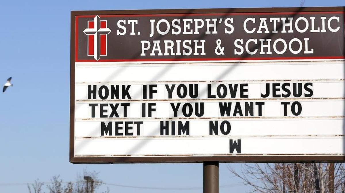A humorous sign at St. Joseph’s Catholic Church and School in Kennewick reminds passing motorists about the dangers of texting while driving.