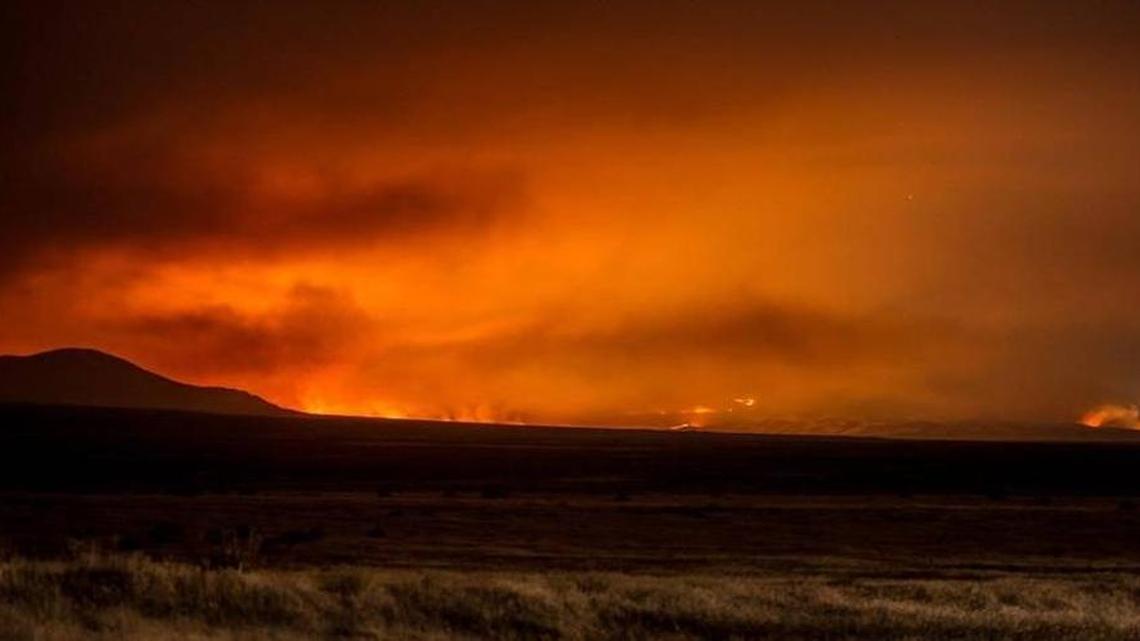 Scott Butner was on Highway 240 when he shot this photo of the Range 12 fire approaching the Hanford Reach National Monument.