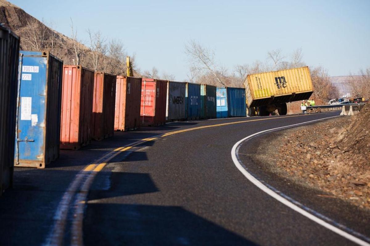 State Department of Transportation crews are placing what will eventually be 600 feet of shipping containers between Thorp Road, at the base of the ridge, and nearby Interstate 82 to prevent damage from a moderate rockfall.