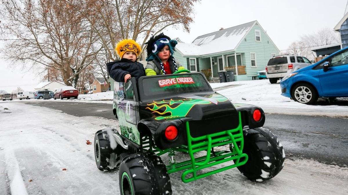 Luke Huckstep, 2, left, enjoys a ride Thursday in his new Christmas truck driven by his cousin, Jackson Bartlett, 3, in Kennewick. Luke’s mom Chyanne Albert of Kennewick was supervising. Tri-City roads were turning icy Thursday night and freezing rain could fall on Friday morning, according to the weather service.