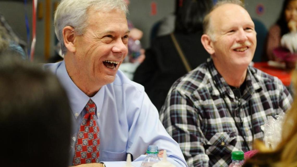 State Rep. Larry Haler, left, talks with employees including Bob Dutton, general counsel, as Energy Northwest marked the 30th anniversary of Columbia Generating Station in this 2014 photo.