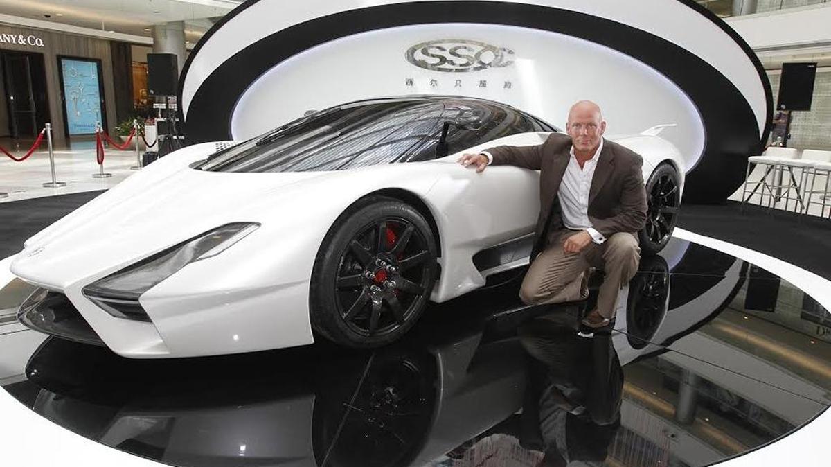 Company founder Jerod Shelby poses with his company’s Tuatara car at an unveiling event in Shanghai.
