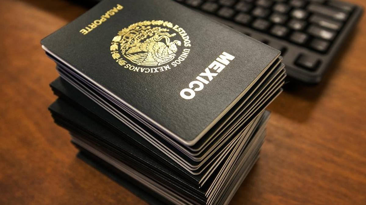 At Mexico's Consul General office in Austin, Mexican nationals wait for their passport and consul IDs to be processed.
