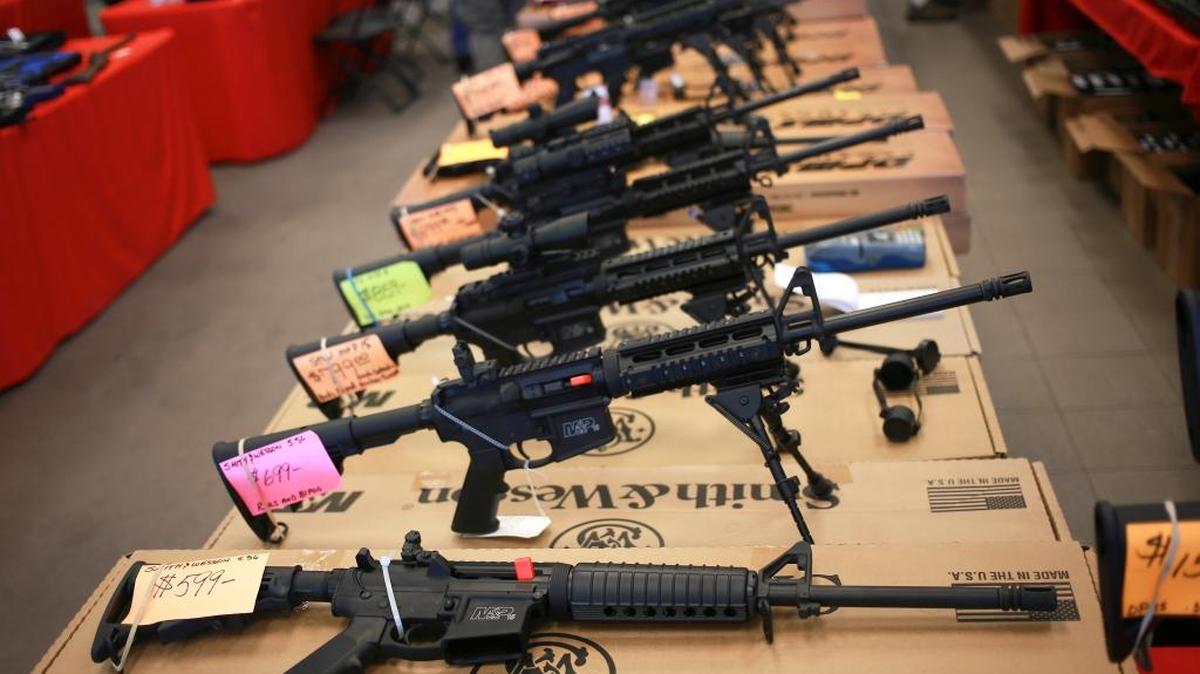Smith & Wesson AR-15 rifles for sale at a gun show in Loveland, Colo., in 2014. The military-style gun, a version of which was used in the Pulse night club mass shooting that left 50 dead on June 12 has become, simultaneously, one of most beloved and most vilified rifles in the country.