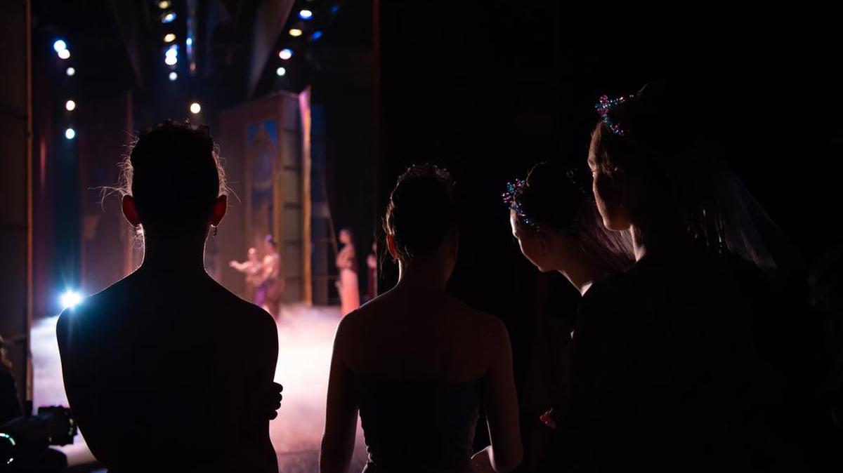 Mid-Columbia Basin company dancers watching backstage during the 2018 Nutcracker performance.