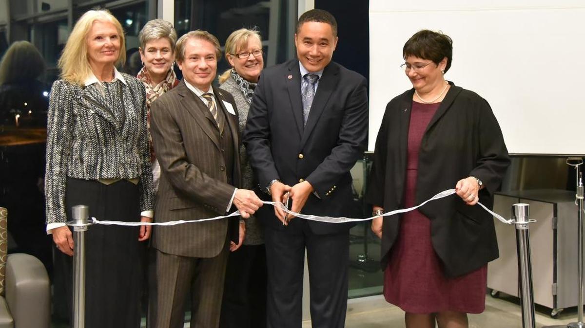 A ribbon cutting at the School of Engineering and Applied Sciences inauguration included WSU Tri-Cities vice chancellor Michele Acker-Hocevar, left, regent Lura Powell, SEAS director Joseph Iannelli, college dean emerita Candis Claiborn, Tri-Cities chancellor Keith Moo-Young and WSU first lady Noel Schulz.
