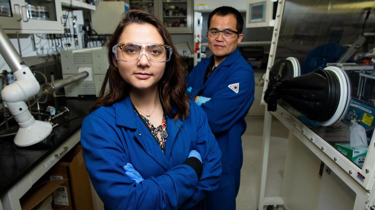 Researchers Cassidy Anderson and Dongping Lu conduct battery research at the PNNL’s Physical Sciences Laboratory.