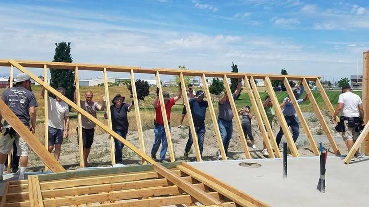 Habitat for Humanity volunteers work on a home in Pasco.