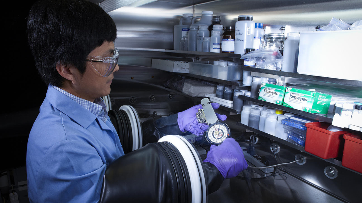 PNNL materials scientist Xiaochuan Lu assembles a sodium-beta battery in a glove box. Researchers at PNNL are advancing energy storage technologies that could be used in consumer electronics, for transportation and to store energy, including that generated by renewable resources, so that it can be used when and where it is needed on the grid.