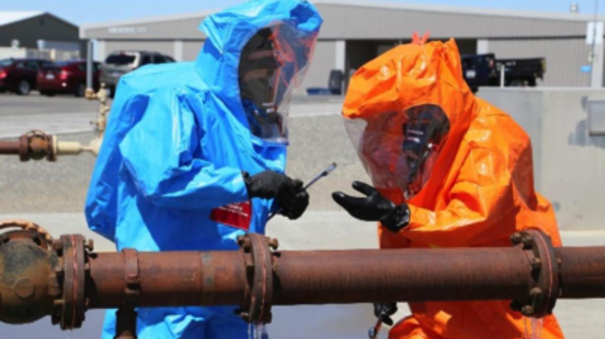 Students at HAMMER use an above ground pipeline prop for hands-on training to repair a simulated leak.