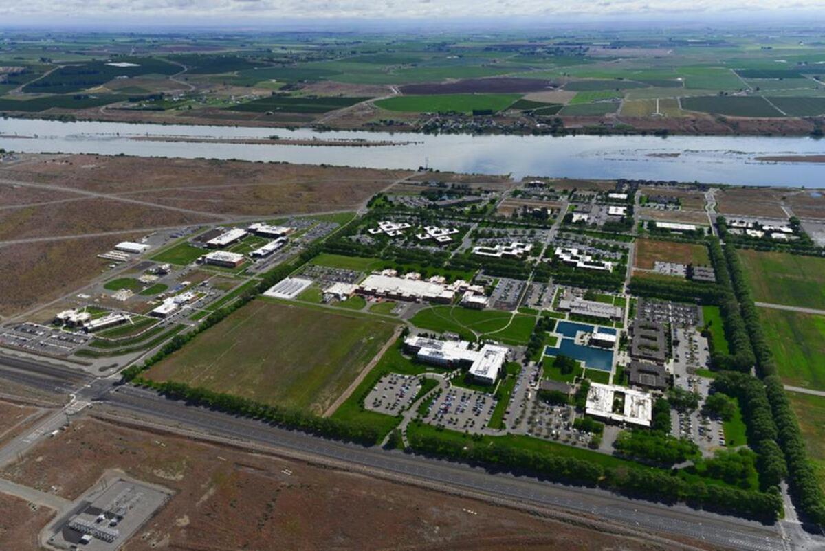 A recent aerial photo of the PNNL campus captured from the west (looking east). From here you can see the NW corner that will be home to the new ESC facility as well as the recent facilities added to the north end of the campus.