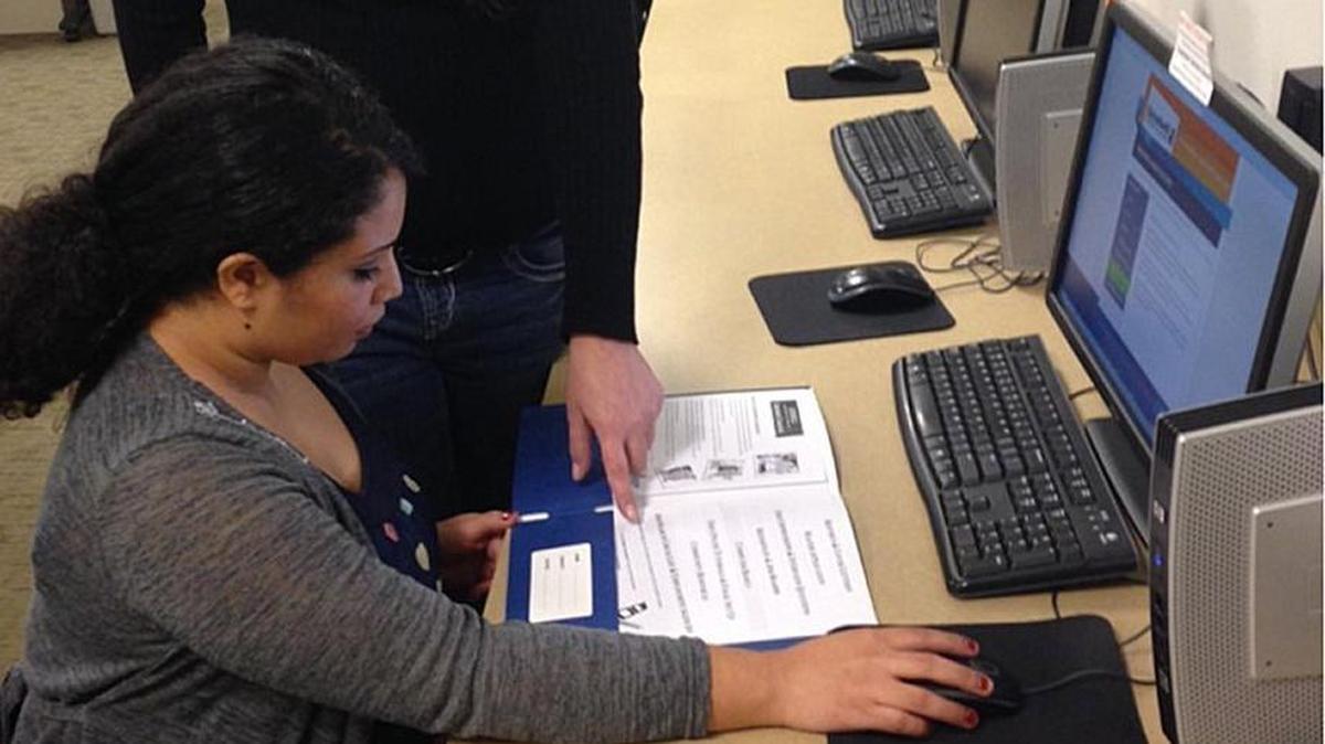 Goodwill Employment Specialist Ginny Nicolls assists a job seeker in the Pasco Employment Connection Center.