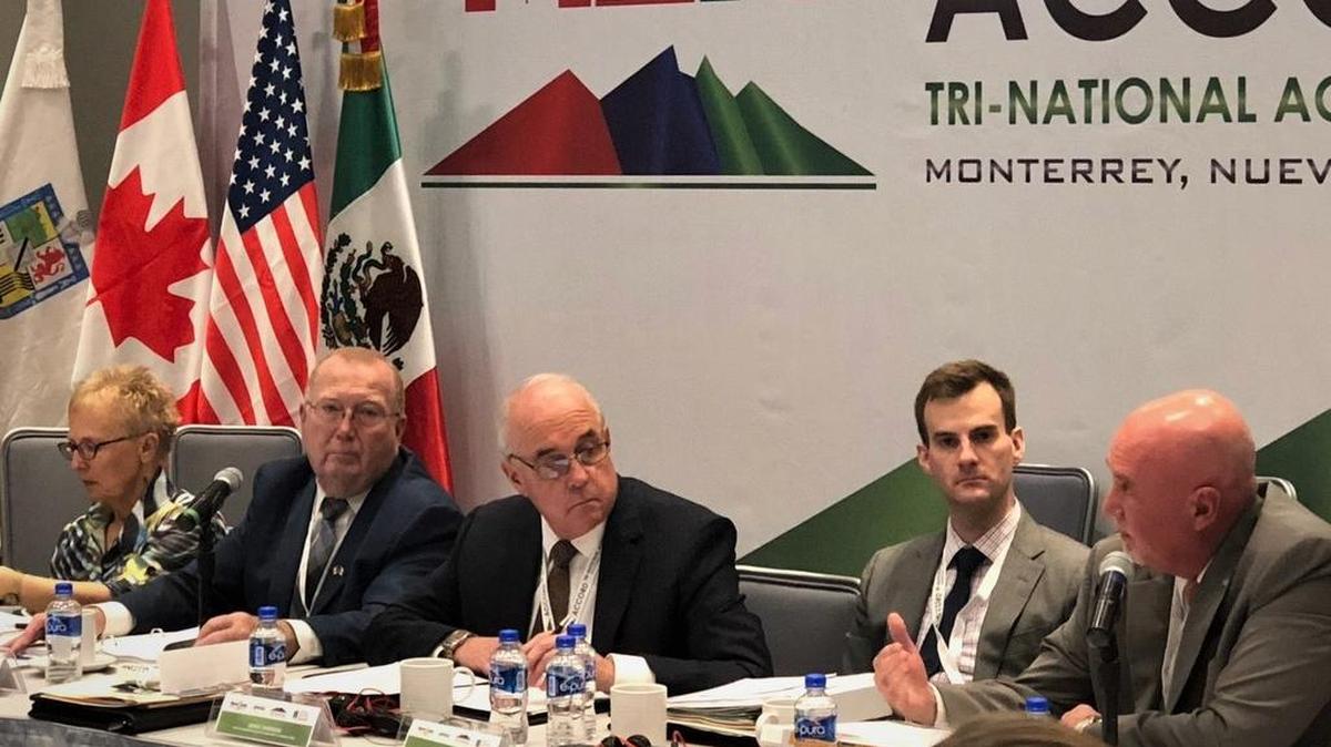 Director Sandison meets with Canadian representatives at the Tri National Accord last October.