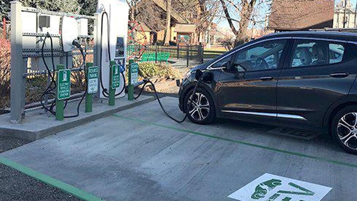 An electric vehicle plugs in at the charging station at Caboose Park in Dayton, Wash. Energy Northwest led the installation efforts of the new charging station with support from a grant from Pacific Power. The station consists of one Level 2 charger and one Level 3 “DC Fast” charger.