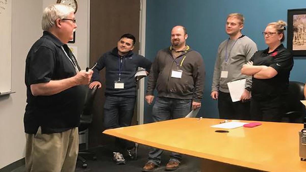 Judson Kenoyer, CHP, CIH, provides instruction to students during a radiation safety course held at the NV5/Dade Moeller Training Academy